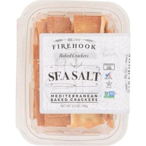 Organic sea salt baked crackers in clear plastic container.