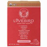 Healthy Roots Lovebird Strawberry Cereal box with vibrant red packaging.