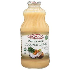 Organic pineapple coconut juice in a glass bottle with fruit illustration.