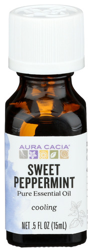 Pure peppermint essential oil in small amber bottle for aromatherapy and cooling relief.