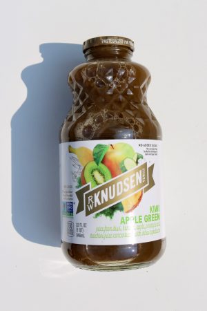 Healthy Roots Kiwi Green Apple Juice bottle on white background.