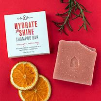 Healthy Roots hydrate shine shampoo bar with dried orange slices and rosemary.