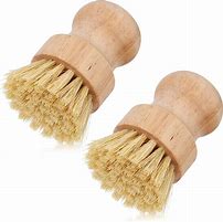 Two bamboo handleless dish scrubbing brushes for eco-friendly cleaning.
