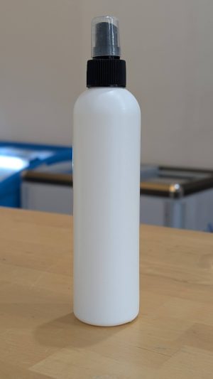 White 8oz plastic spray bottle for gardening and plant care.