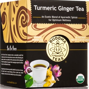Turmeric Ginger Tea box with a cup of tea and flowers for wellness.