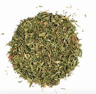 Dried alfalfa leaves for herbal supplement and tea.