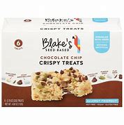 Rice crispy treats with chocolate chips on a white background.
