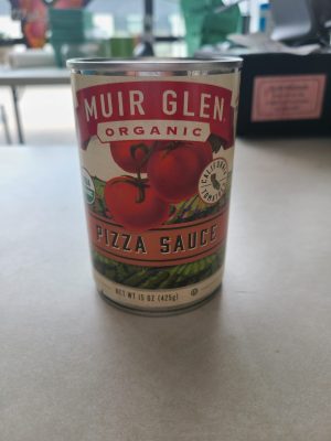 Muir Glen organic pizza sauce can with tomatoes and basil.