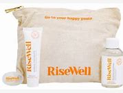 Healthy Roots RiseWell travel kit with natural skincare products in a bag.