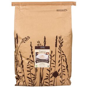 Organic brown rice flour in a brown paper bag with plant illustrations.