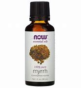 Pure myrrh essential oil in a dark glass bottle with label from Healthy Roots.
