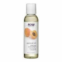 Pure apricot oil in a clear bottle with apricot images on label.