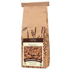 Organic carob baking chips in a brown paper bag from Healthy Roots.