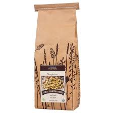Organic cashew pieces in a brown paper bag from Healthy Roots.