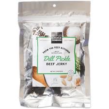 Dill pickle beef jerky in a clear resealable bag from Healthy Roots.