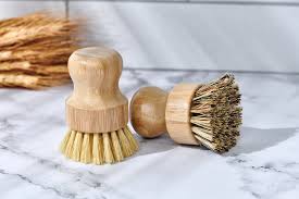 Eco-friendly bamboo dish brushes with handleless design for sustainable cleaning.
