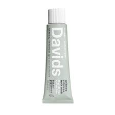 Travel-sized DAVIDS whitening toothpaste with peppermint flavor.