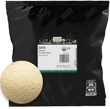 Organic garlic granules in a black package with a close-up of the product.