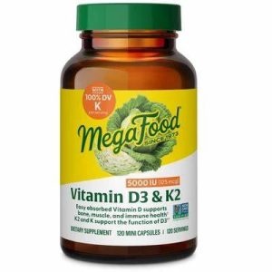 Vitamin D3 & K2 supplement bottle with MegaFood label and green cap.