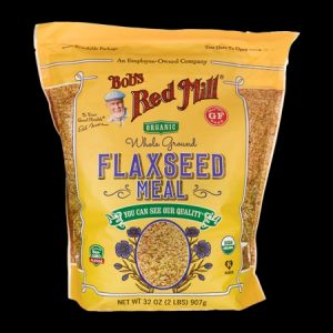 Organic flaxseed meal in yellow packaging with product details.