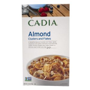 Cadia Almond Clusters and Flakes cereal box with almonds and berries.
