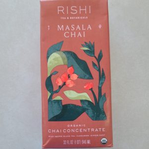 Rishi Masala Chai Organic Concentrate box with herbal illustration.