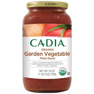 Organic garden vegetable pasta sauce jar with tomatoes and carrots.