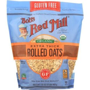 Gluten-free organic rolled oats in a blue package with red label.