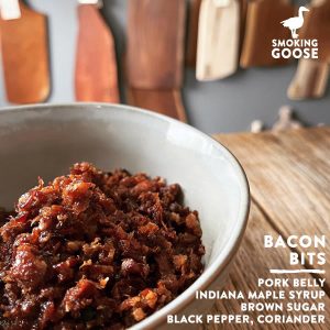 Close-up of bacon bits in a bowl for cooking or garnishing.