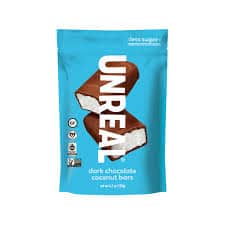 Unreal Coconut Bars in blue packaging with chocolate coating and coconut filling.