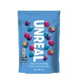 Healthy Roots Unreal Peanut Gems snack in vibrant blue packaging.