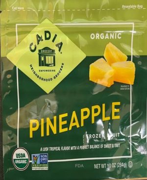 Organic frozen pineapple chunks in resealable bag for healthy snacking.