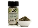 Organic basil leaf supplement bottle with fresh basil leaves and ground basil in a bowl.
