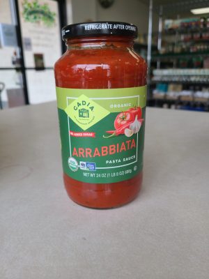 Organic Arrabbiata pasta sauce jar with garlic and chili peppers.