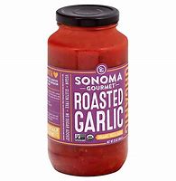Jar of Sonoma Roasted Garlic Pasta Sauce with purple label and black lid.