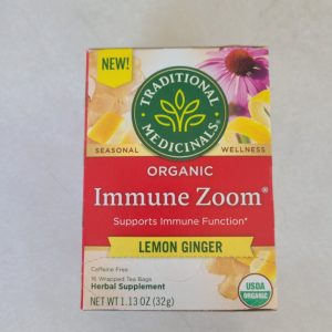 Immune Zoom Lemon Ginger herbal tea box with lemon and ginger images.