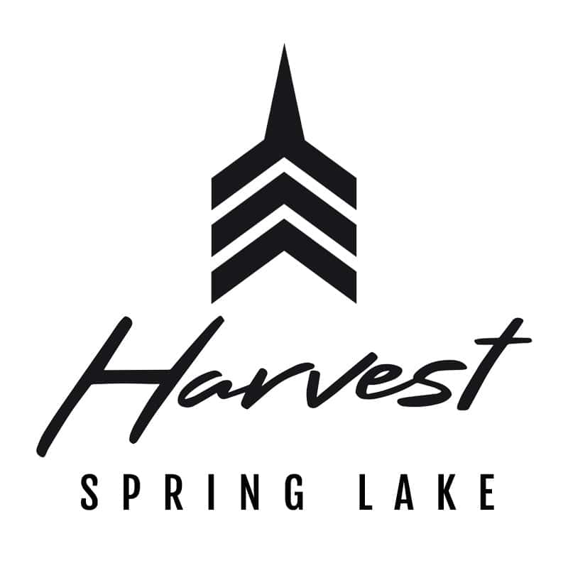 Modern Michigan lakeside home with panoramic spring lake views, spacious interiors, and luxurious am
