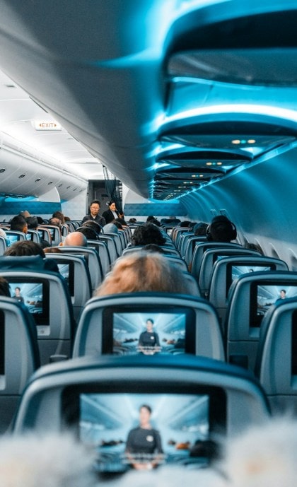 people in airplane during daytime