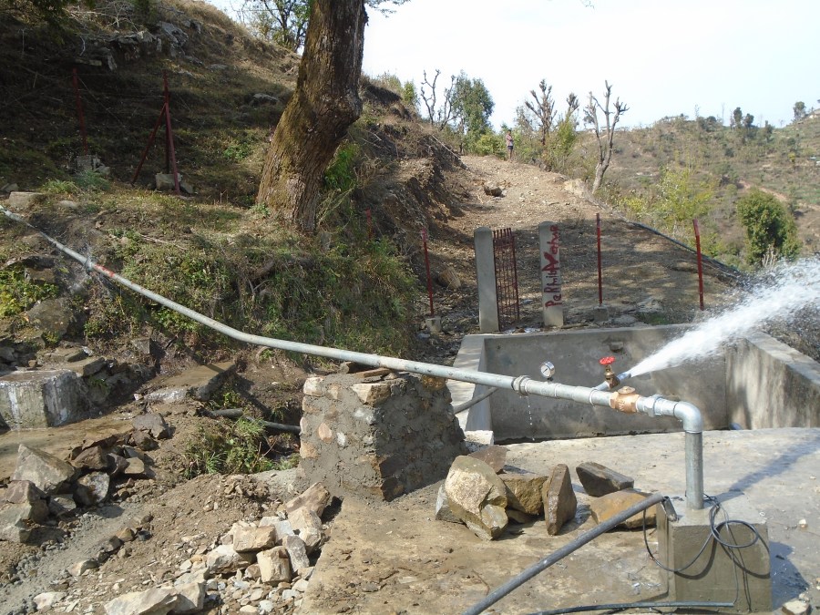 Testing of the water pump as water sprays out from the tap in an uncontrolled way. 