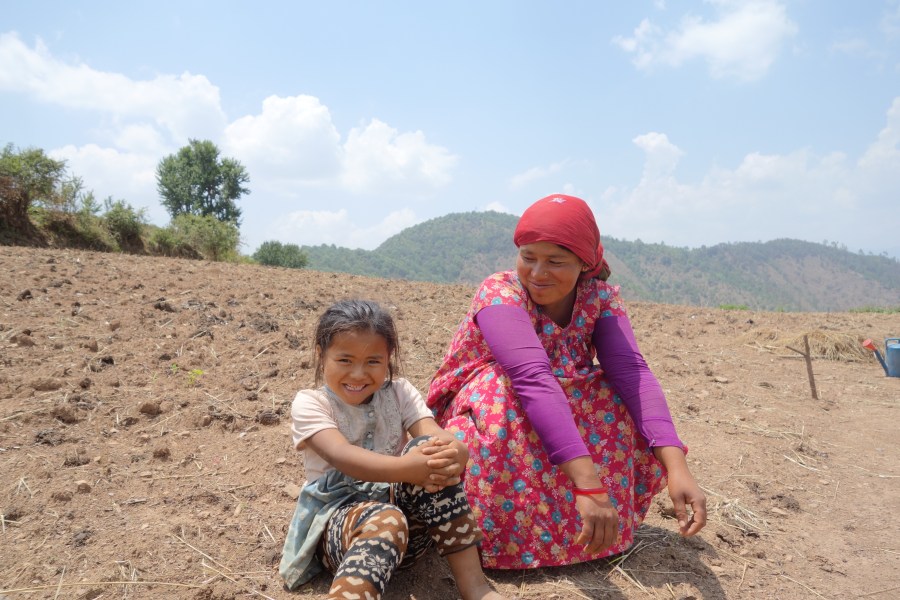 Suntali’s daughter and granddaughter in their agricultural field