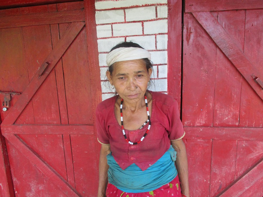 Rupkali stands in front of a building in Surkhet.