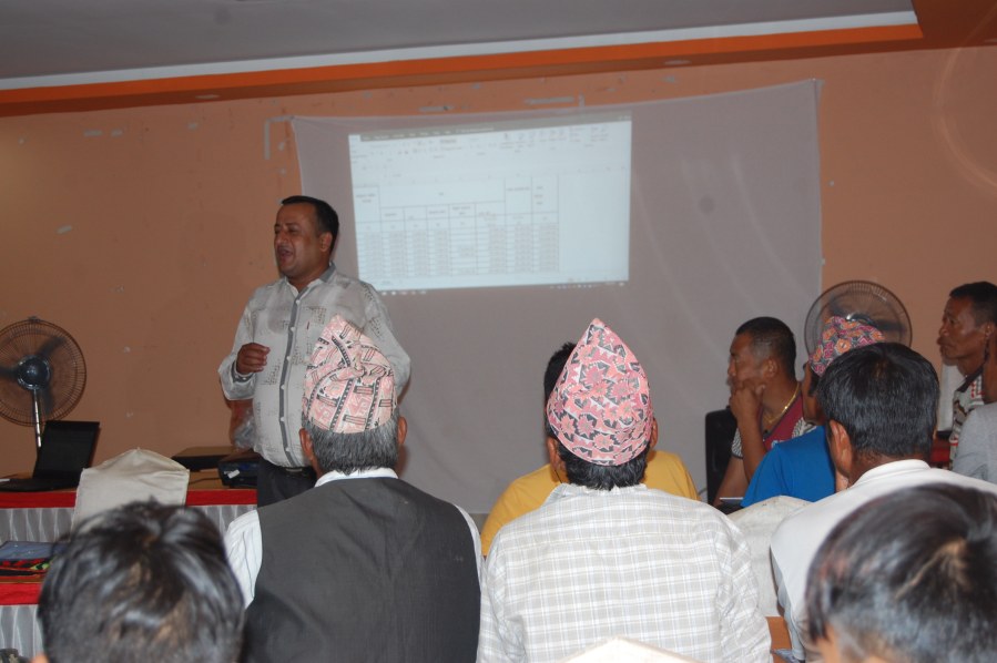 Renewable World's Regional Project Officer, Ganga Acharya, introduces the financial training.