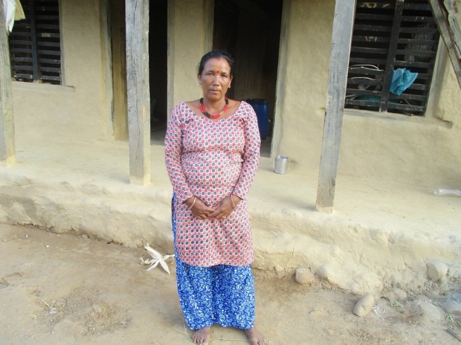 Manisara standing in front of a building in Surkhet.