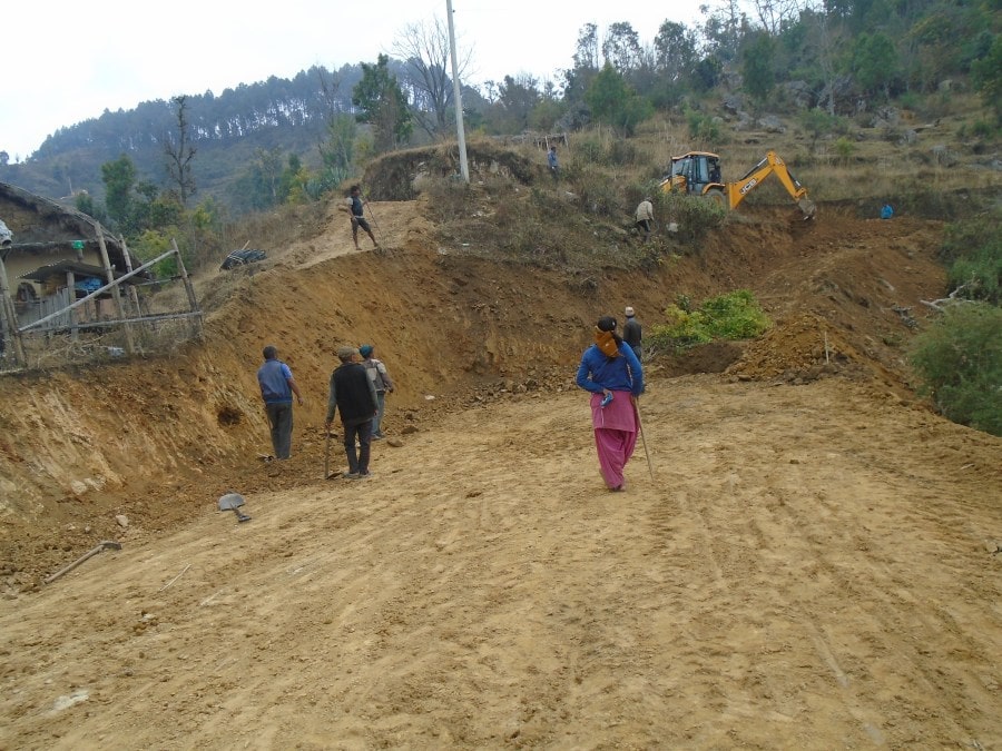 The flattened land created by the yellow JCB digger in preparation of the installation of the solar panels.