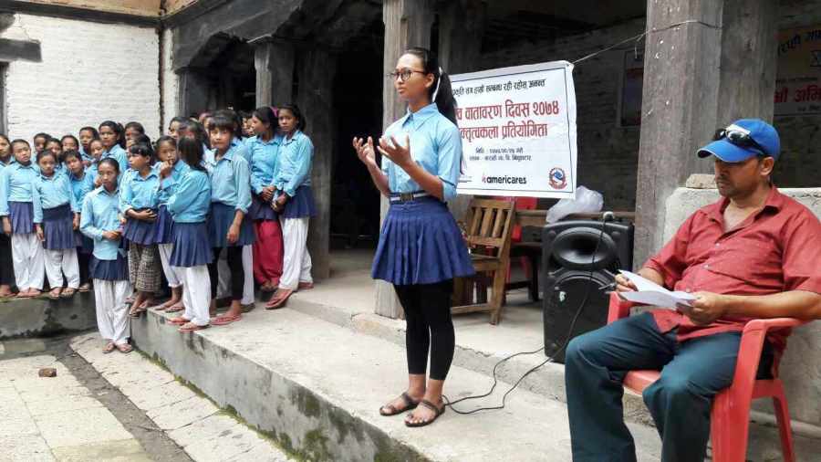 A schoolgirl addresses the school.