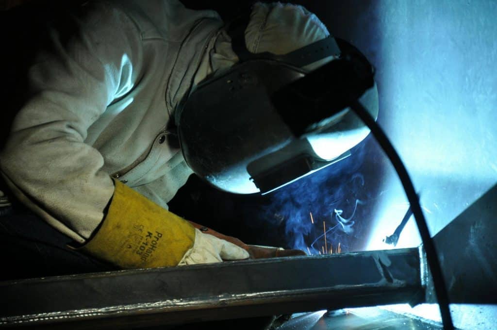 Welding inspection performed in a fabrication shop to ensure quality and safety standards are met.