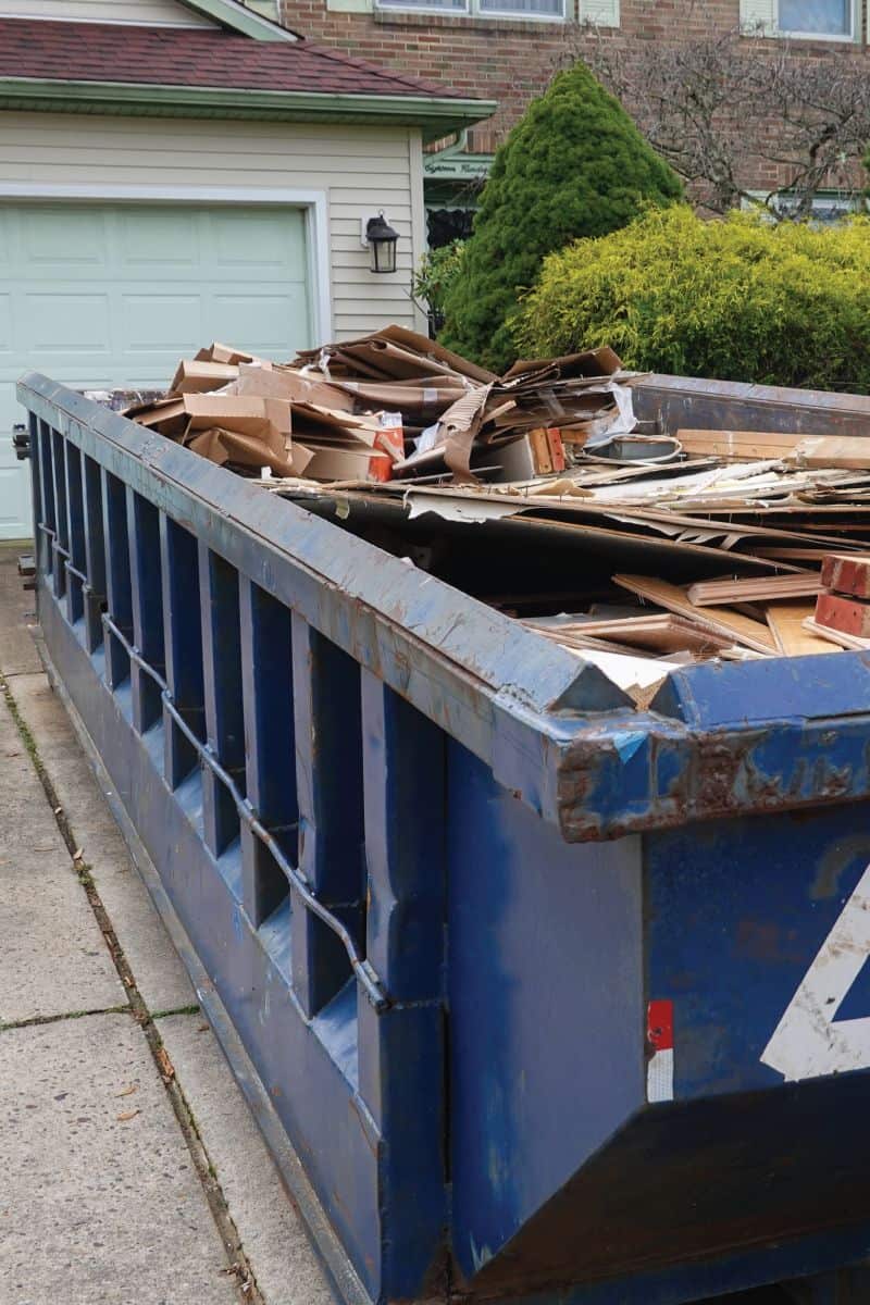 dumpster filled with construction waste