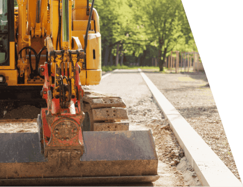 loader next to sidewalk 1 480x371 (1)