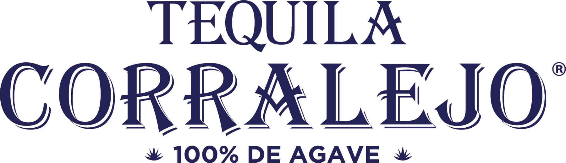 Tequila Corralejo bottle with agave plants in the background.