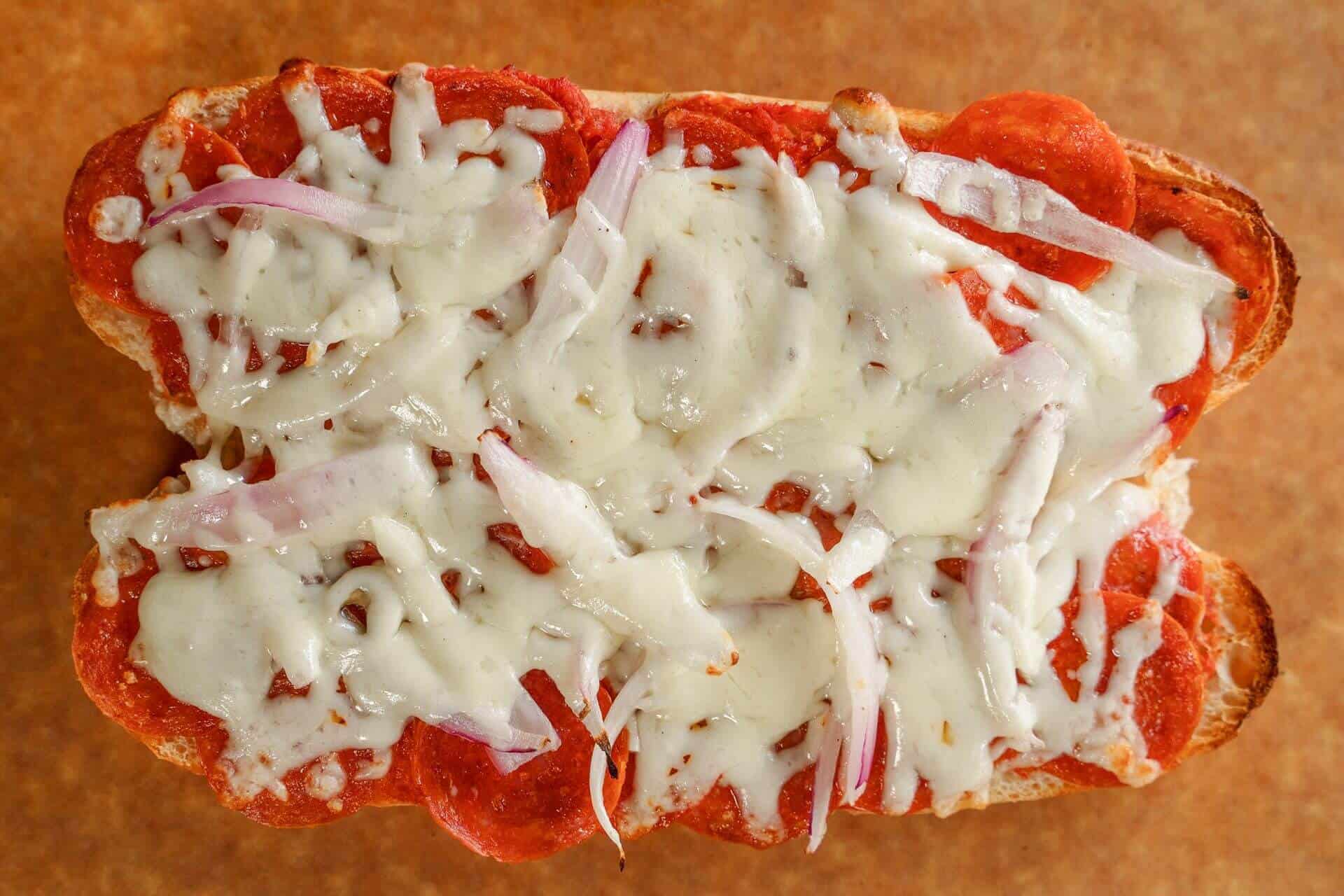 Close-up of a Sicilian pizza with cheese and onions from Lombardo's.